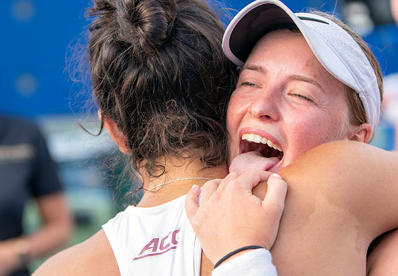 Gabriela Castaneda (L) and Carla Touly celebrate