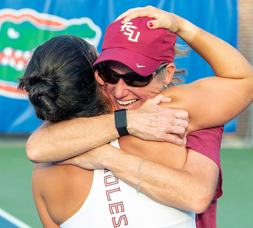 Gabriela Castaneda (L) and FSU coach Jennifer Hyde celebrate