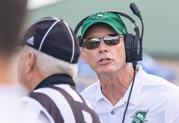 Coach Roger Hughes